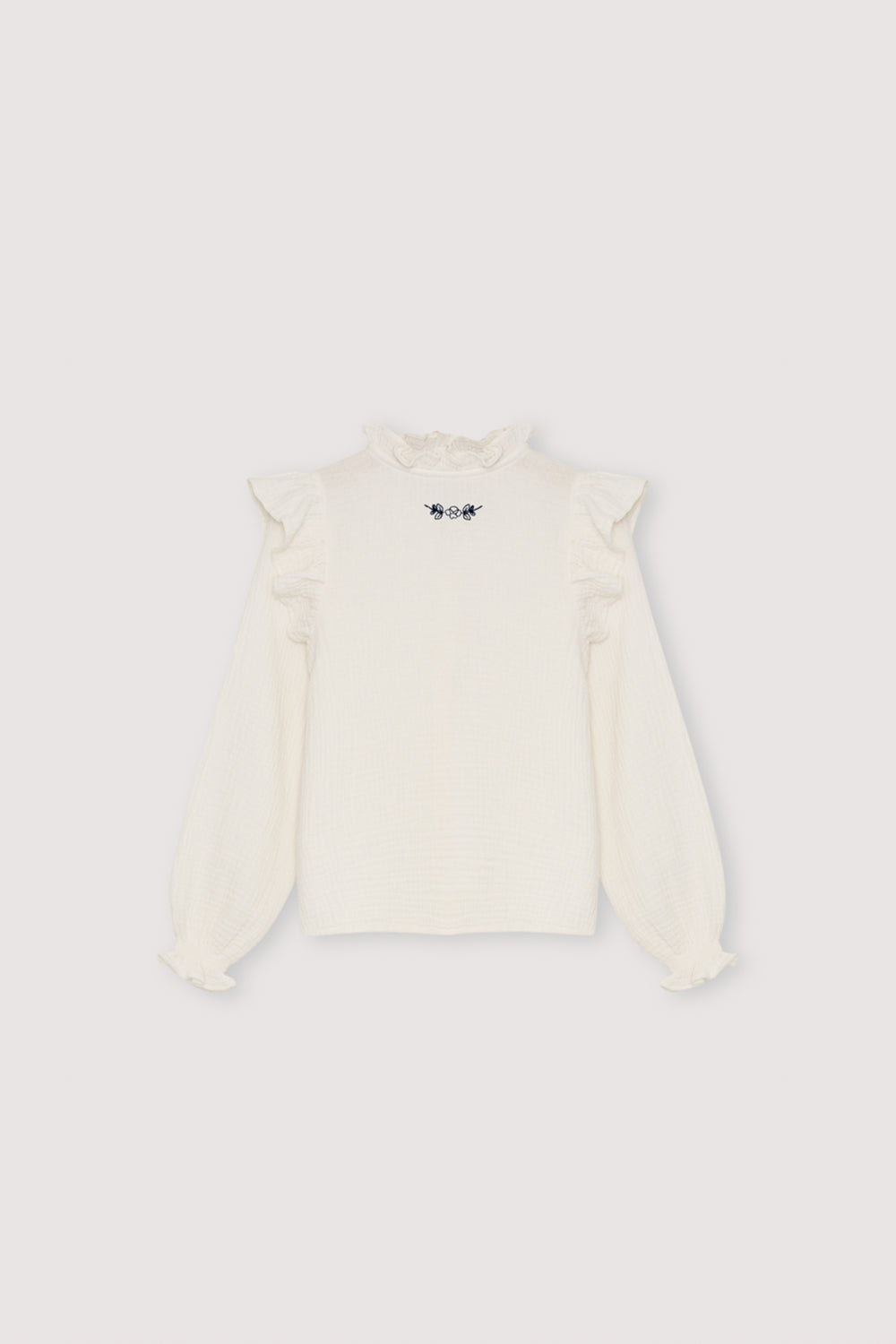 One of our signature double gauze blouse styles, featuring a contrasting embroidery detail at the front for a subtle yet elegant touch. Made from soft, breathable 100% cotton.