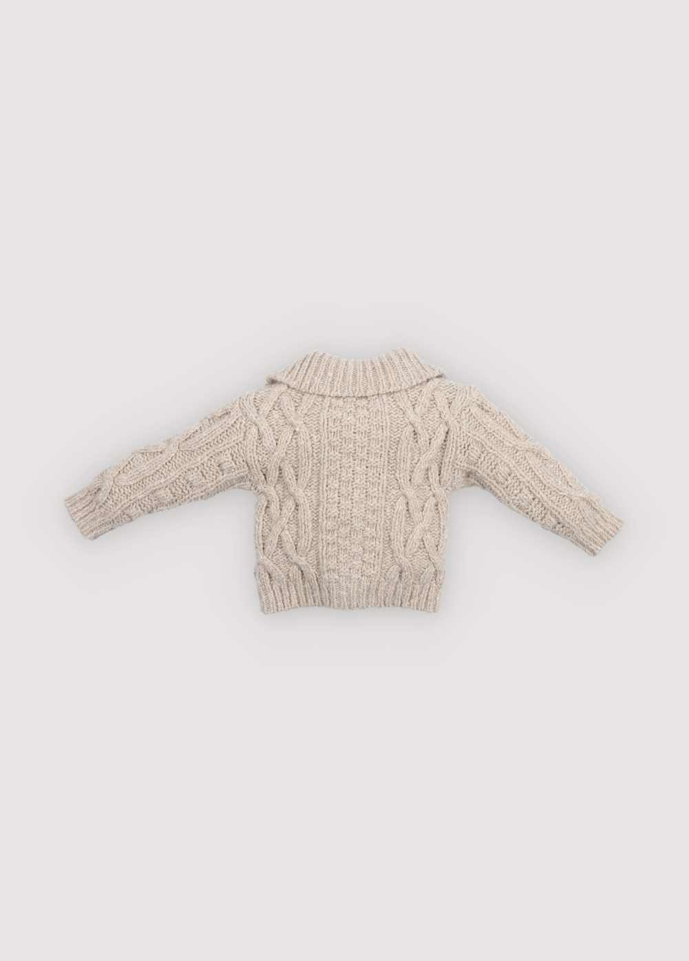 Knitted cardigan with a ribbed neckline, cuffs, and hem. Features a front opening with wooden toggles. Comes with matching knit pants to complete the look. Made with high-quality recycled materials.