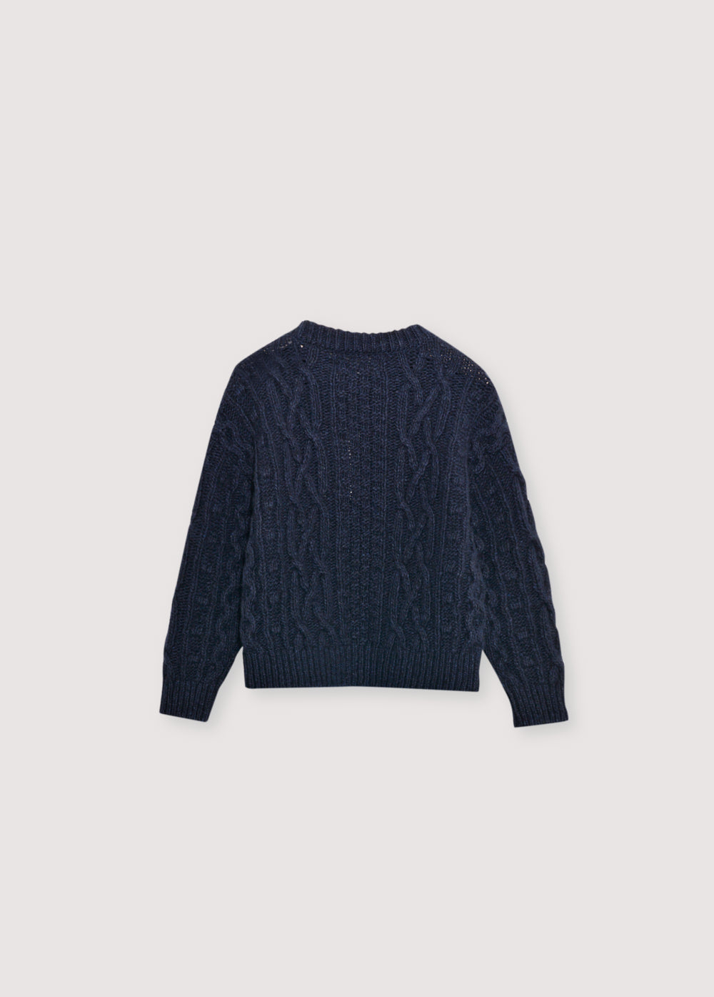 One of our classic knit patterns, this time crafted in recycled wool quality with a new textured knit design.