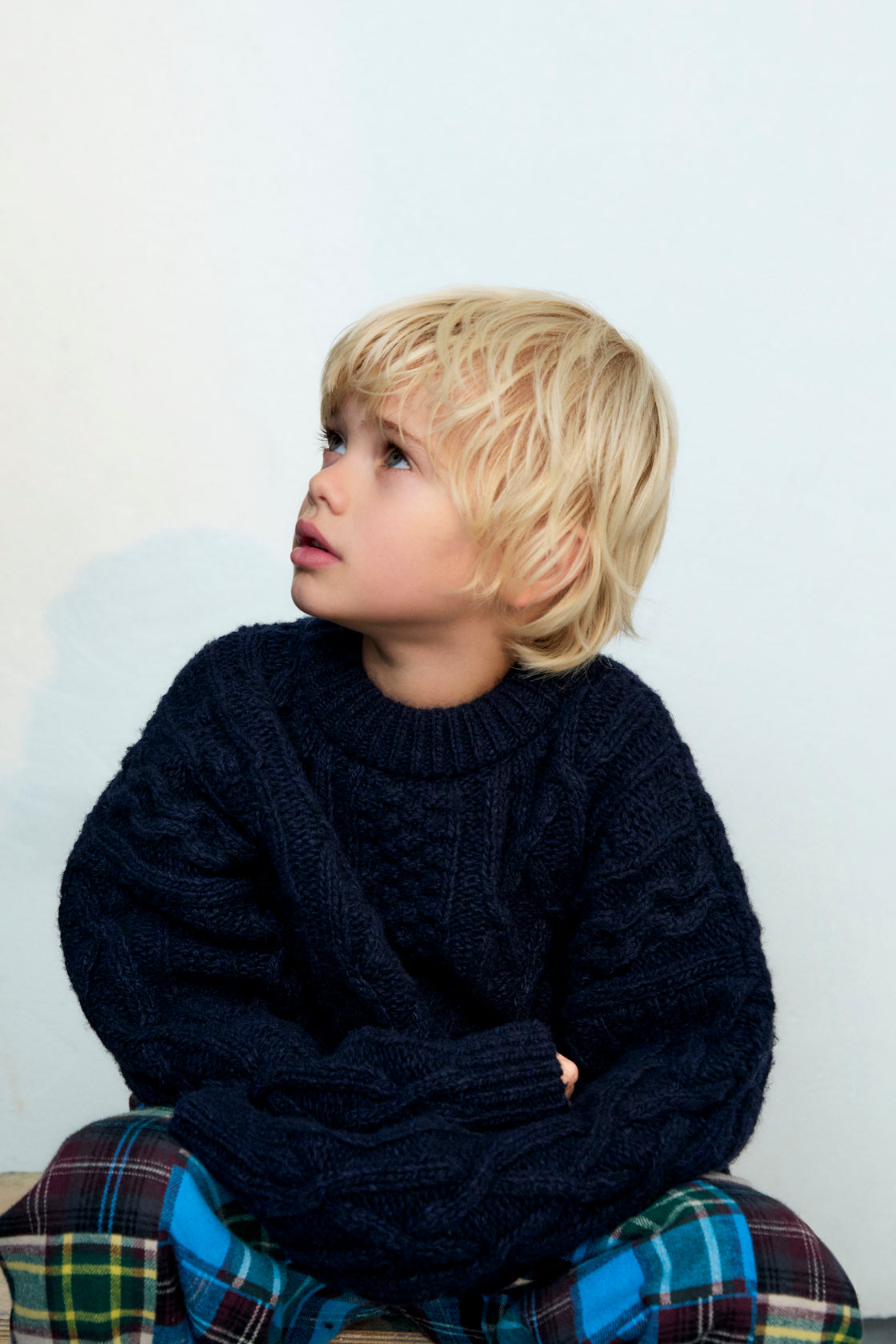 One of our classic knit patterns, this time crafted in recycled wool quality with a new textured knit design.