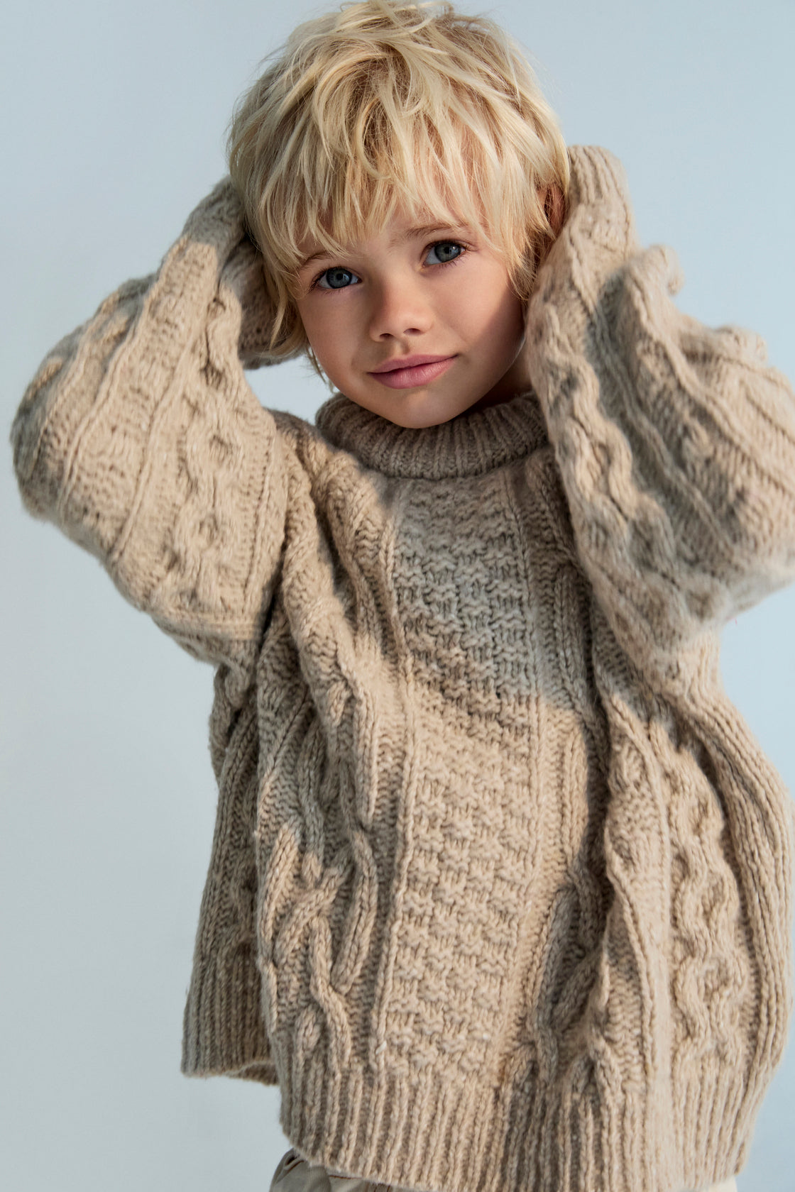 One of our classic knit patterns, this time crafted in recycled wool quality with a new textured knit design.