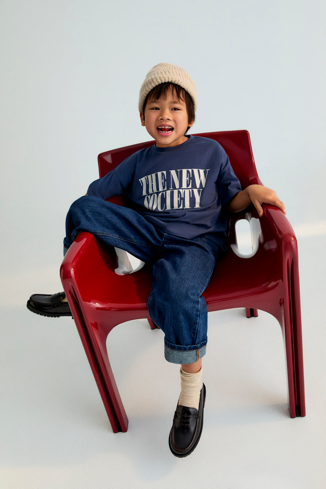 Soft and cozy t-shirt featuring a contrasting "The New Society" logo. Brushed on both the inside and outside for extra comfort.