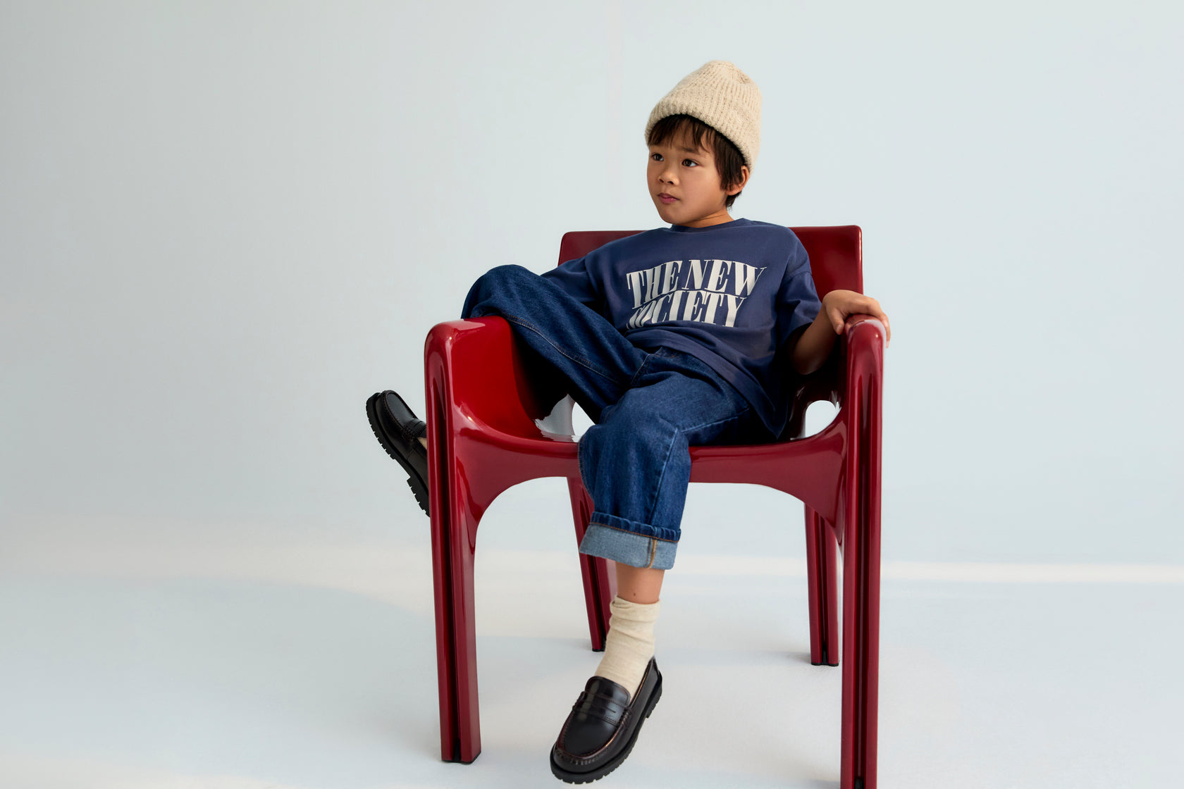 Soft and cozy t-shirt featuring a contrasting "The New Society" logo. Brushed on both the inside and outside for extra comfort.