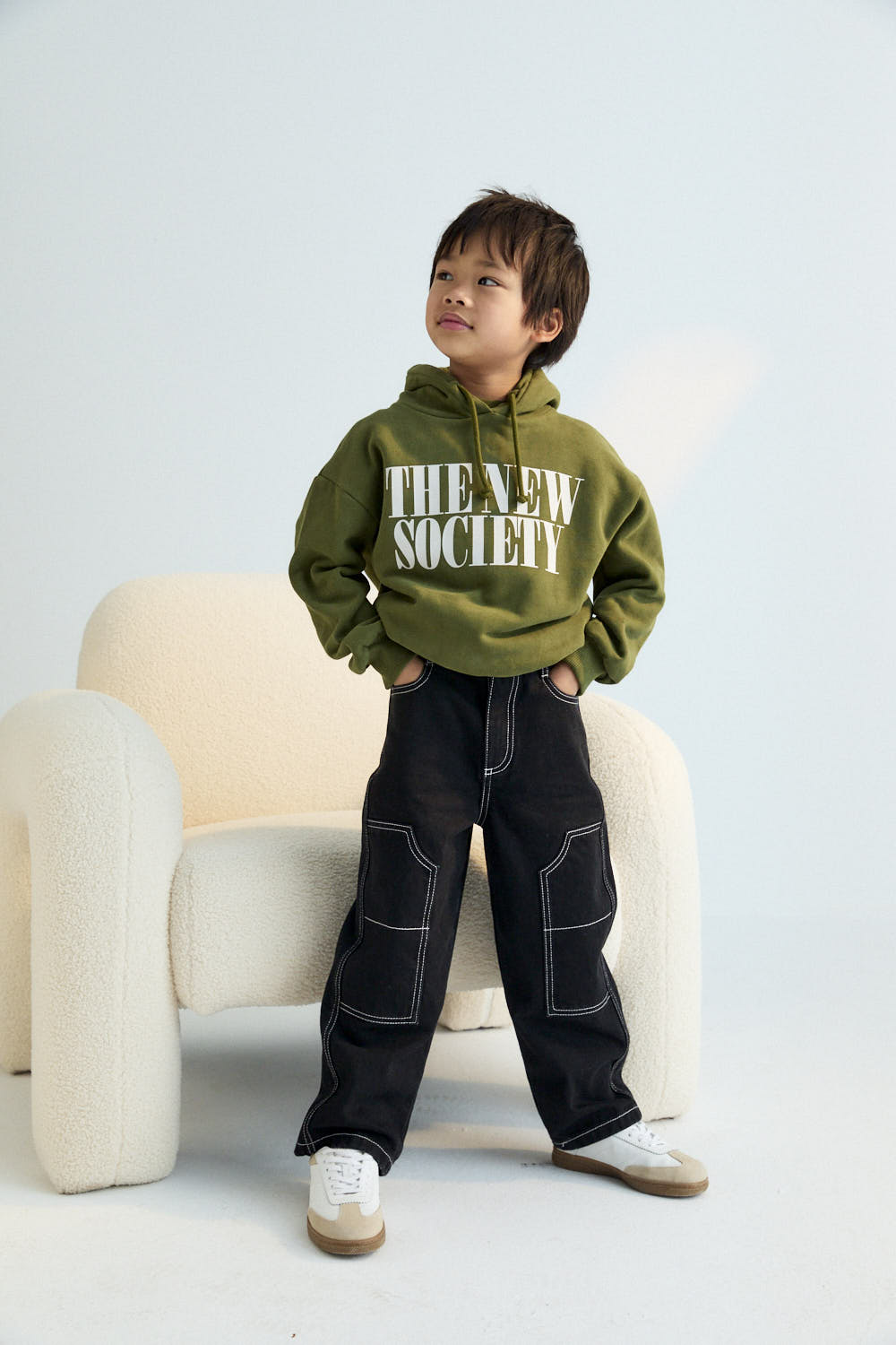 Hoodie with a contrasting "The New Society" print. Perfect for pairing with the matching cargo pants. Brushed on the inside and outside.