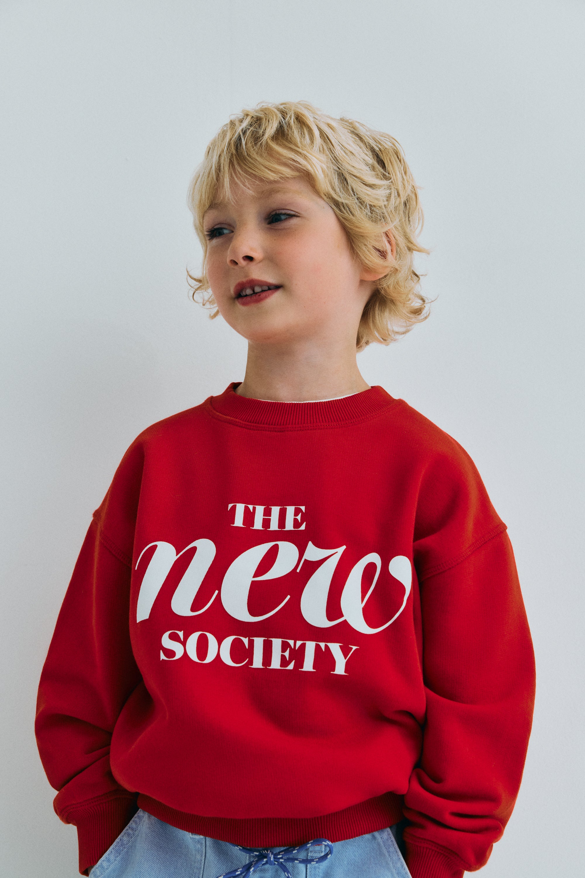 Keep your little one warm and stylish with this vibrant red The New Society sweatshirt. Designed for everyday wear, this kids’ sweatshirt combines a modern design with a soft, comfortable fabric, ensuring all-day comfort.