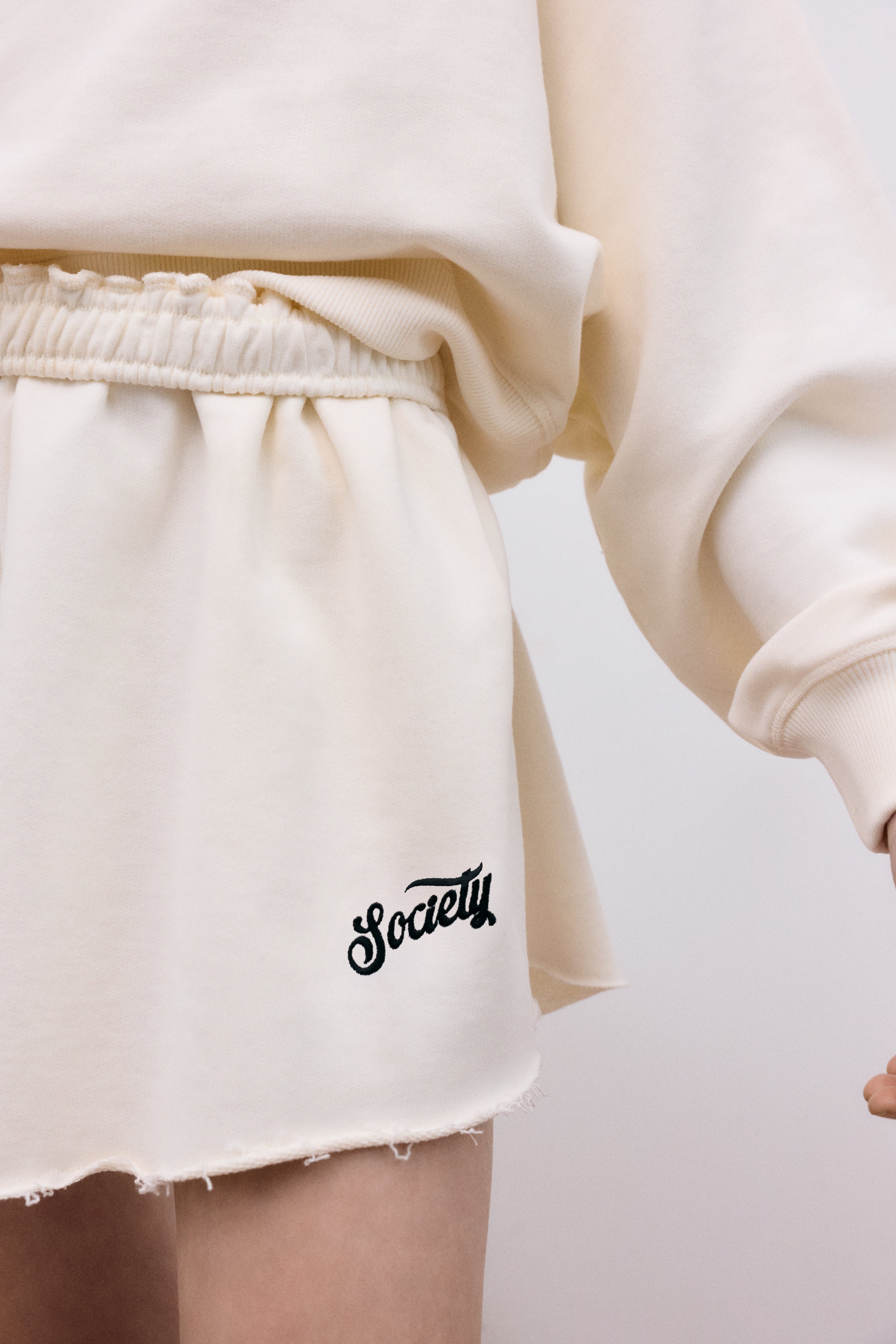 Soft cotton fleece shorts with a wide fit and elastic waistband for comfort.