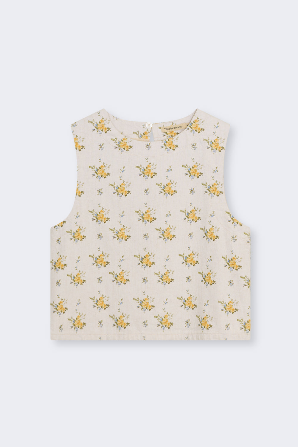 Top vaquero de algodón orgánico
Confeccionado en denim de algodón orgánico, este top presenta un hermoso estampado floral y una delicada abertura trasera con cierre de cerradura y botón.