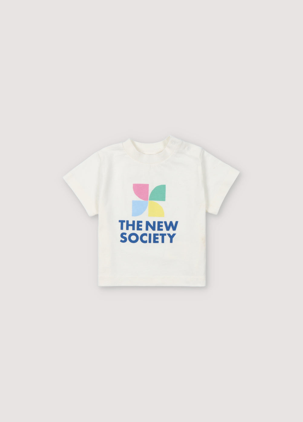Short-sleeved, drop-shoulder t-shirt with colorful logo on the front and shoulder opening with tone-on-tone snaps. Spring Summer Collection. The New Society.
