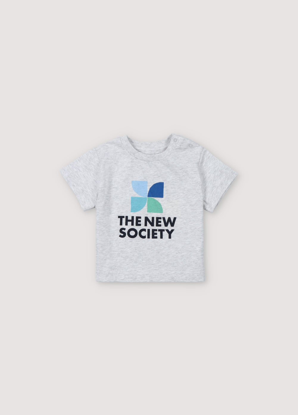 Short-sleeved, drop-shoulder t-shirt with colorful logo on the front and shoulder opening with tone-on-tone snaps. Spring Summer Collection. The New Society.