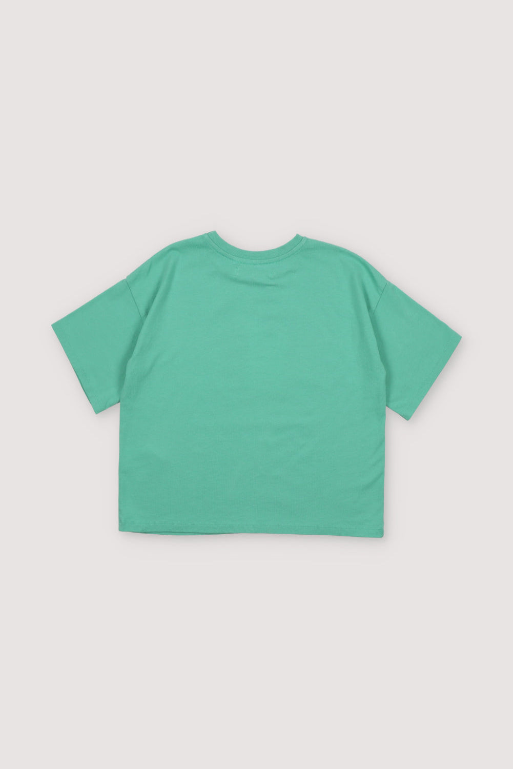 Short-sleeved, drop-shoulder t-shirt with colorful logo on the front. Spring Summer Collection. The New Society.