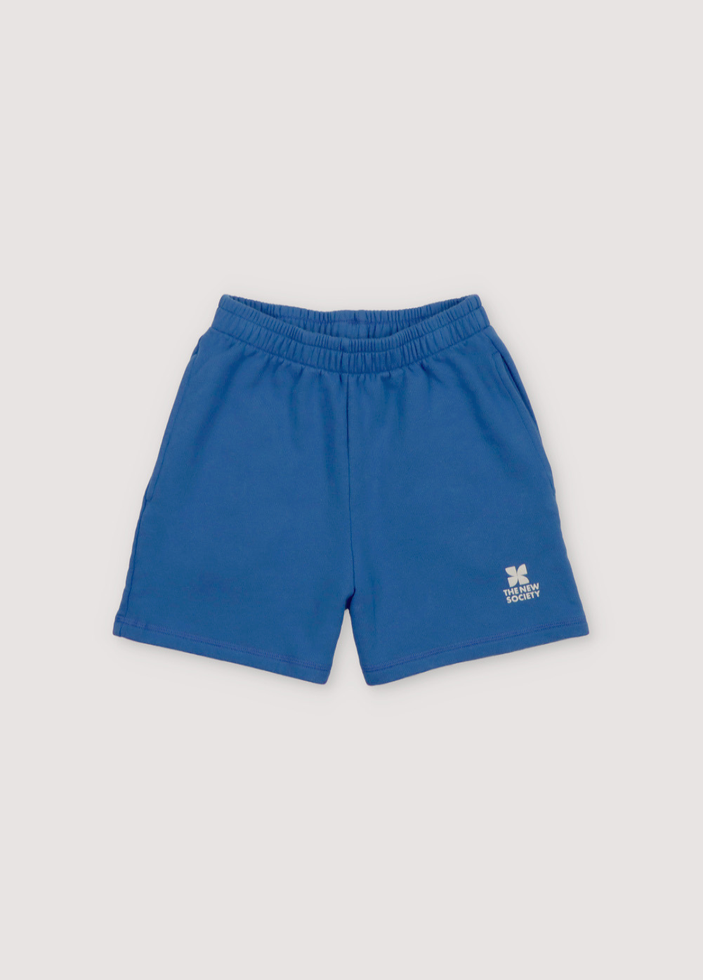 Short with elastic waistband, drawstring, side pockets, and contrast logo print. Spring Summer Collection. The New Society.
