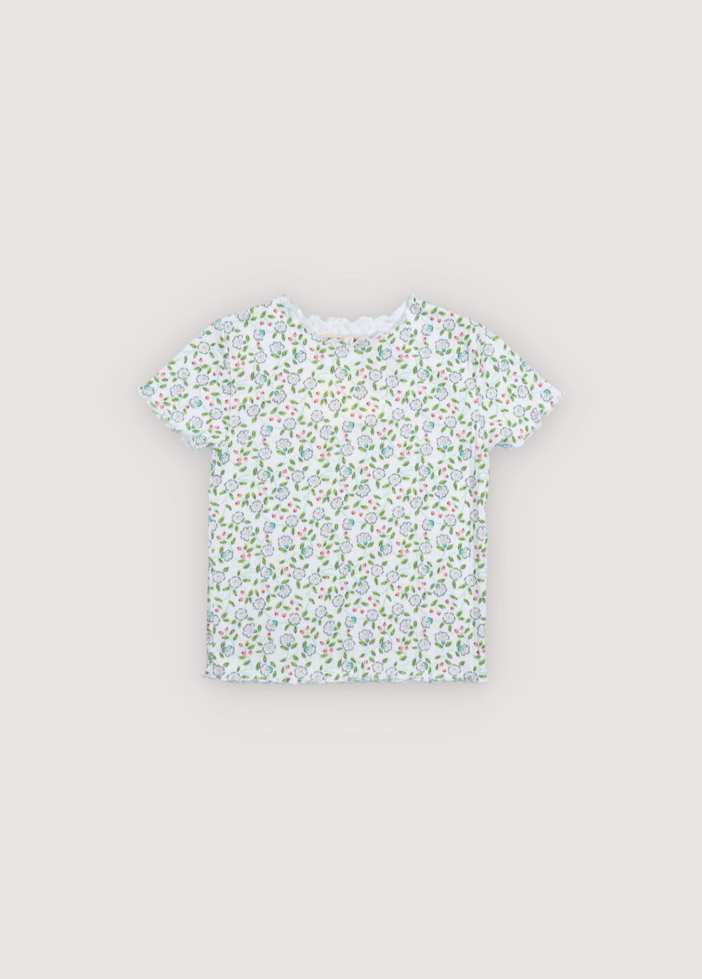 Short-sleeved ribbed overwork t-shirt with a beautiful floral print. It has a baby overlock finish at the neckline, sleeves, and hem. Perfect for creating a total look with the leggings. Spring Summer Collection. The New Society.