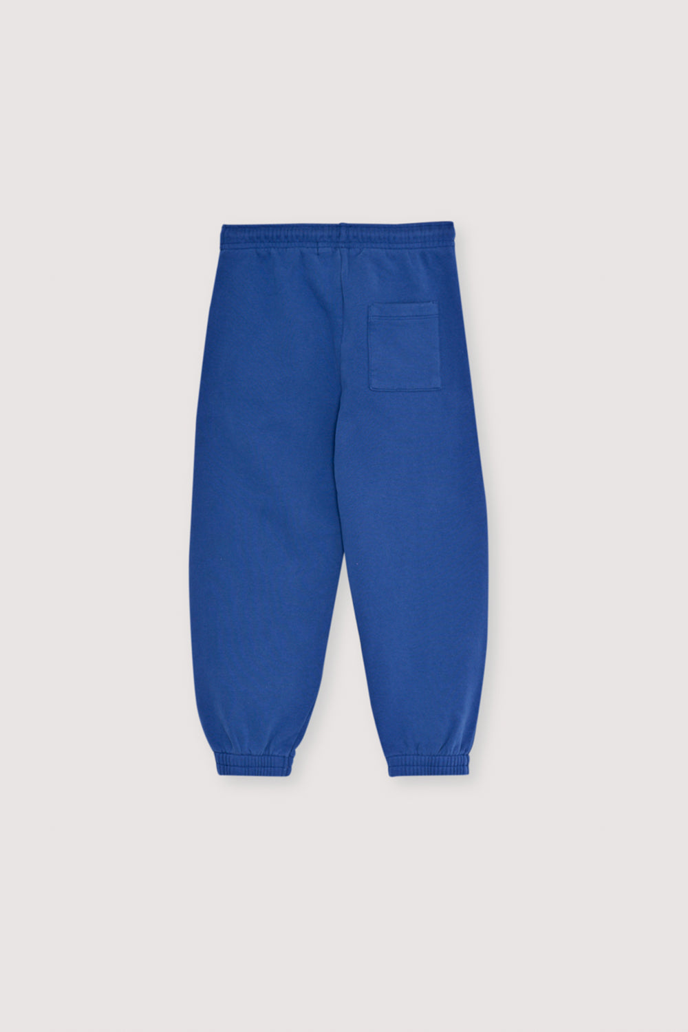 Fleece joggers brushed inside and outside with an elastic waistband and cuffs, featuring a contrasting print detail on the front side. Brushed on the inside and outside. Pair with the matching polo and t-shirt to complete the look.