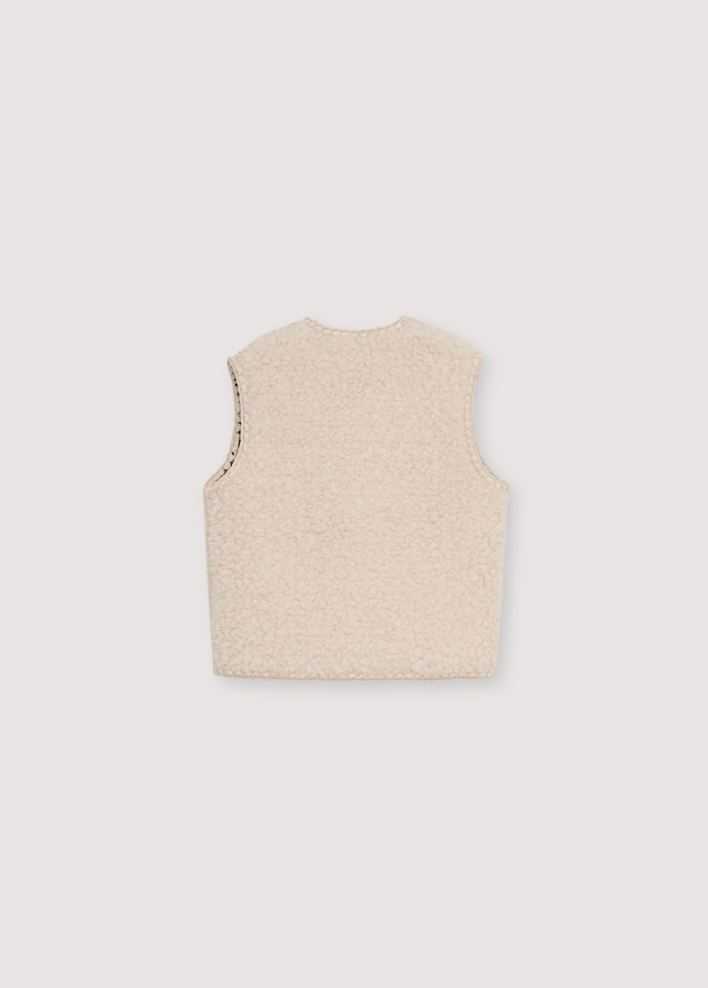 Waistcoat with stitching details and a front closure with original toggles. It has an interior lining with a leopard print detail.