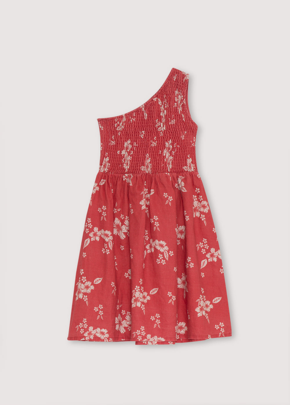 Nauplia Teen Dress in 100% linen with our chili beach flowers print. The dress features an asymmetric smocked bodice, with a waist cut that will create volume in the skirt. Spring Summer Collection. The New Society.