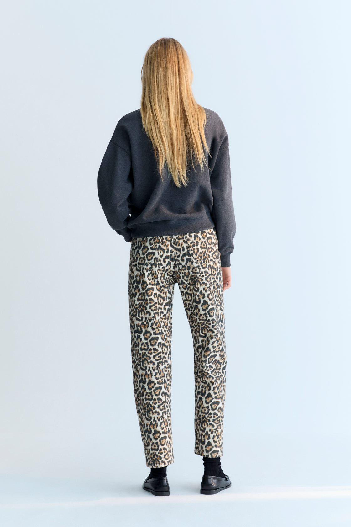 These regular-fit denim trousers stand out with their bold Nelia leopard print, bringing a fresh take to a classic silhouette.