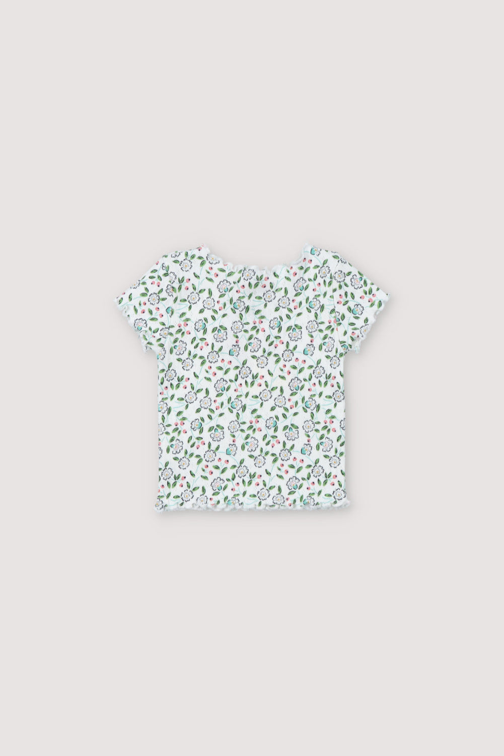 Short-sleeved ribbed t-shirt with a lovely floral print and baby overlock finishes on the collar, cuffs, and hem. It comes with matching leggings. Spring Summer Collection. The New Society.