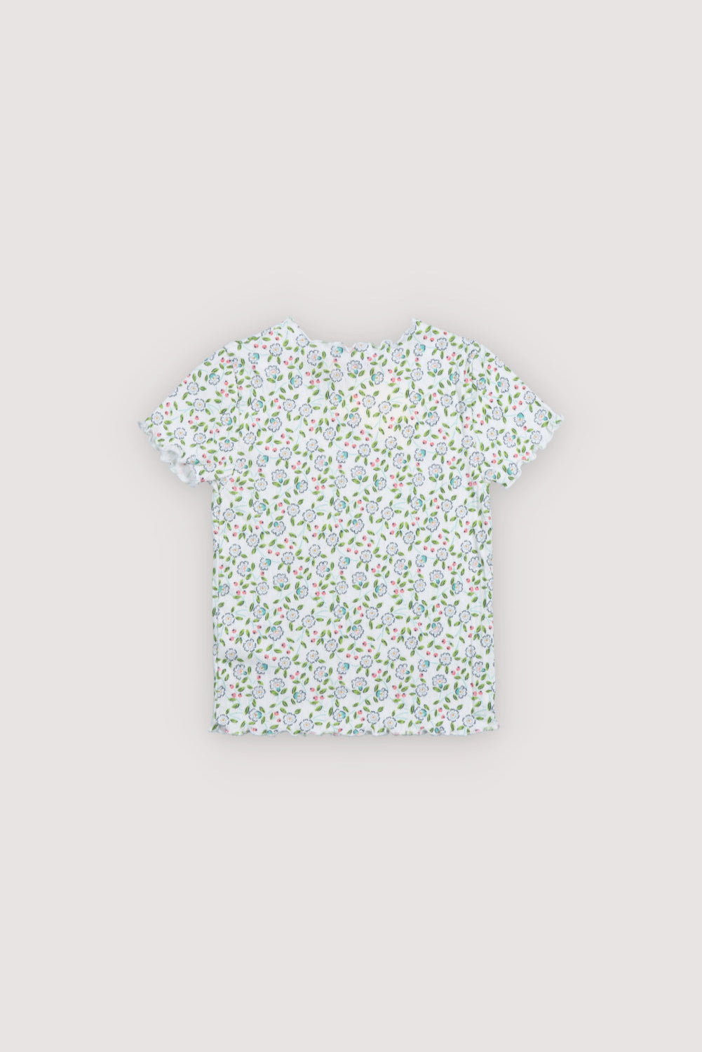 Short-sleeved ribbed overwork t-shirt with a beautiful floral print. It has a baby overlock finish at the neckline, sleeves, and hem. Perfect for creating a total look with the leggings.