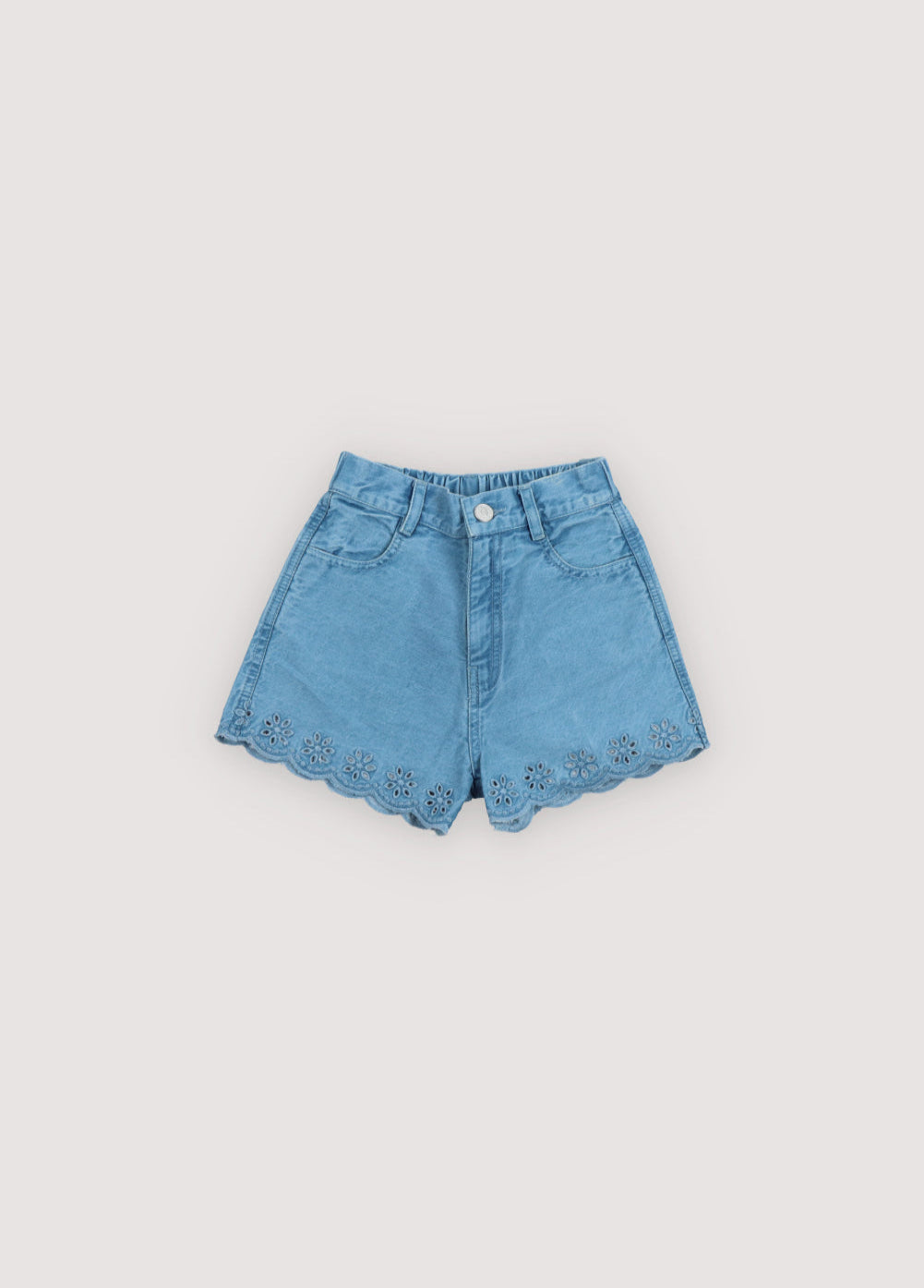 Lightweight denim shorts with branded buttons and patch pockets on the back. It has embroidery detailing on hems. Perfect to combine with the matching jacket. Spring Summer Collection. The New Society.