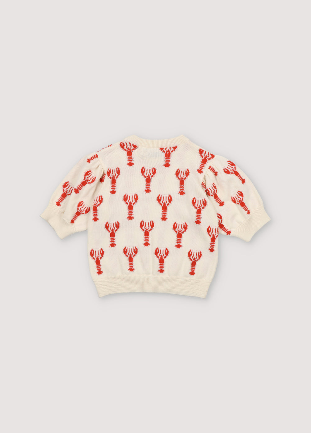 Knit top with a playful lobster intarsia pattern and ribbed neckline, cuffs, and hem. It has matching shorts to create a perfect summer look. Spring Summer Collection. The New Society.