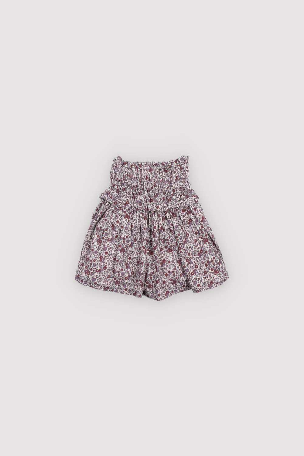 Our classic skirt style, now in double gauze with a beautiful floral print. It features smocked detailing and comes with a matching blouse to complete the look.