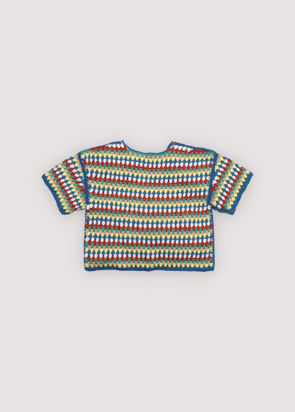 Crochet shorts with colorful stripes and ribbed elastic waistband. It comes with a jumper and a bucket hat to create a total look. Spring Summer Collecton. The New Society.