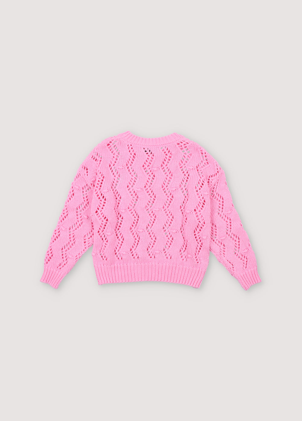 Sweater with an original textured knit that makes it a special garment. It features ribbing on the neckline, cuffs, and hem, and has a dropped shoulder sleeve design. Spring Summer Collection. The New Society.