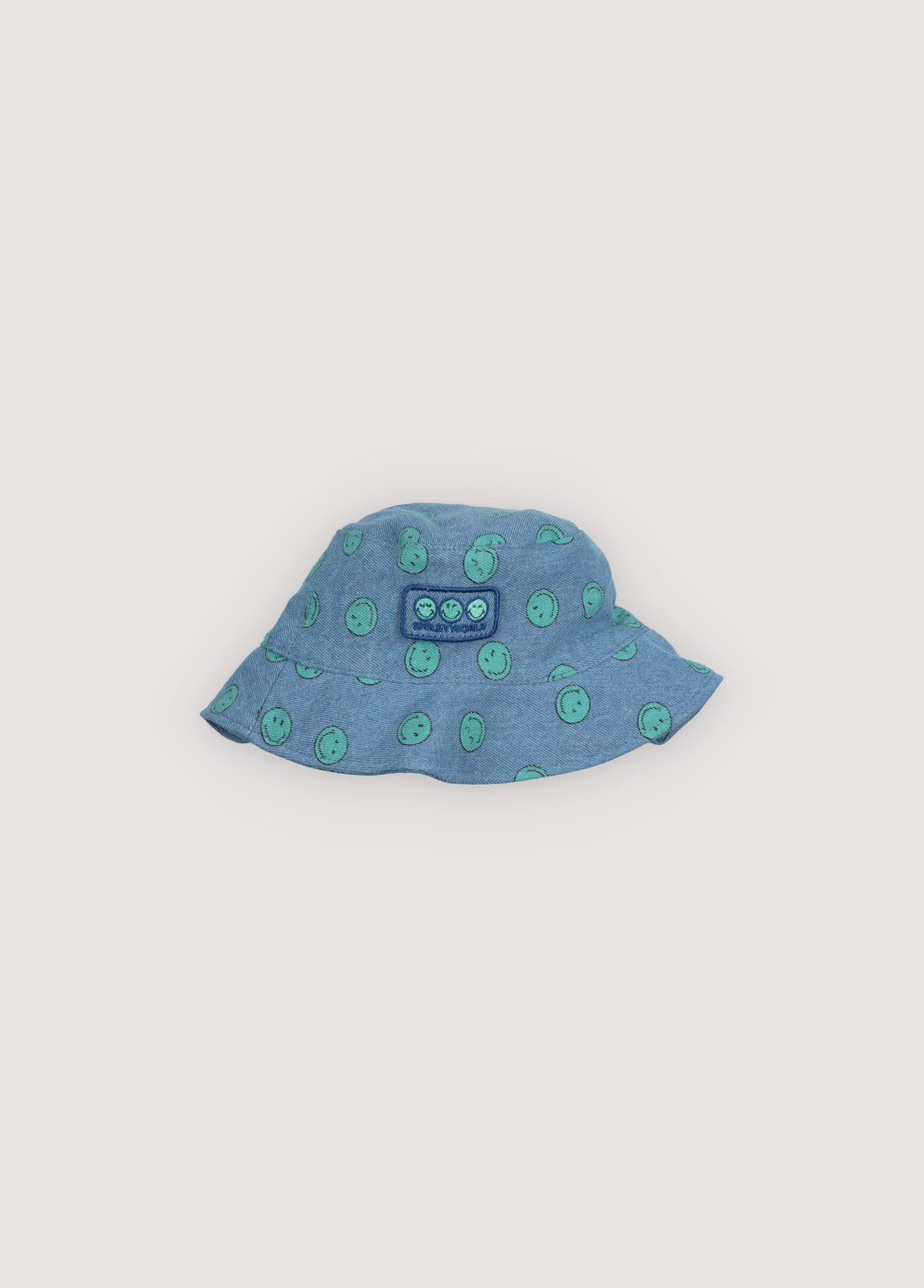 Denim bucket hat with a fun SMILEY WORLD print and embroidered patch detail. Spring Summer Collection. The New Society.