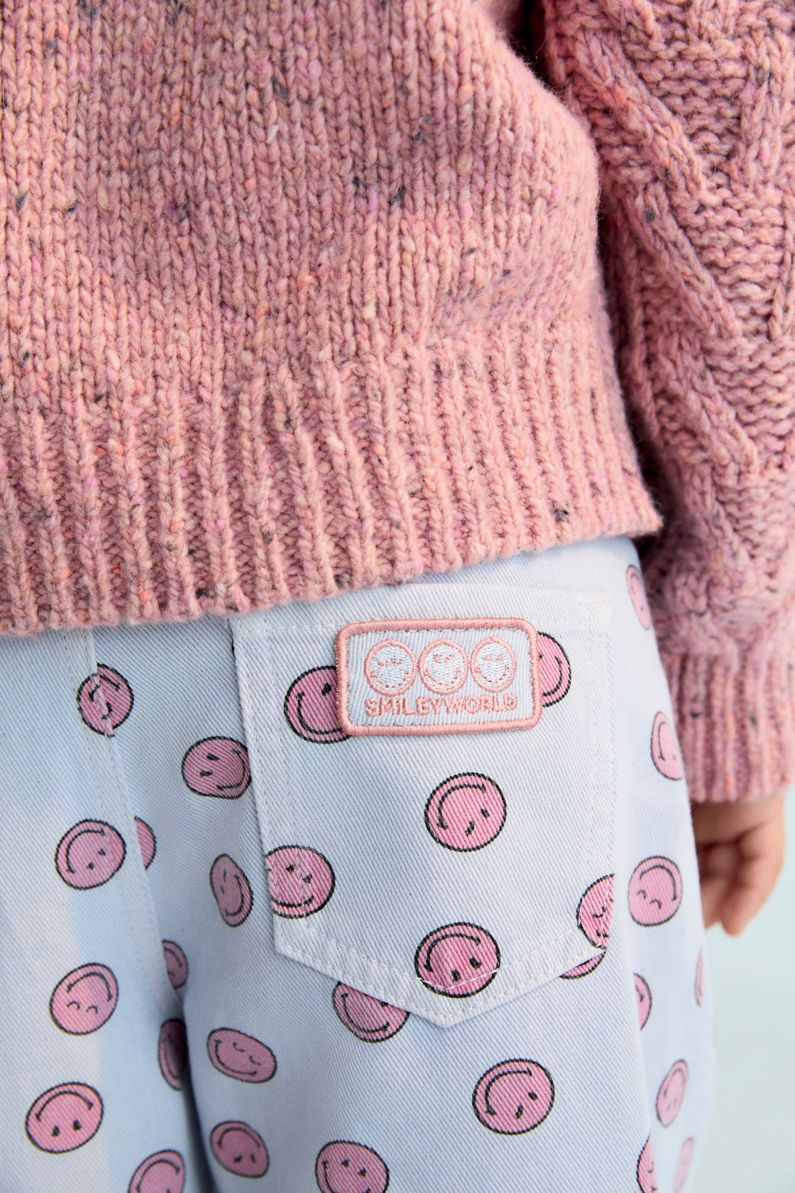 Denim pants with a classic five-pocket design, featuring an all-over SmileyWorld® print that adds a playful twist to a timeless silhouette.