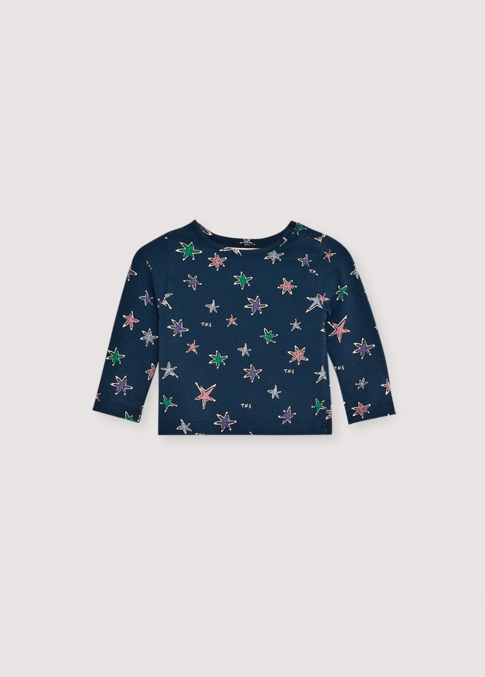 Jersey t-shirt with a round neck and floral print. Features a shoulder opening with tone-on-tone snaps. Pair with the matching leggings to complete the total look