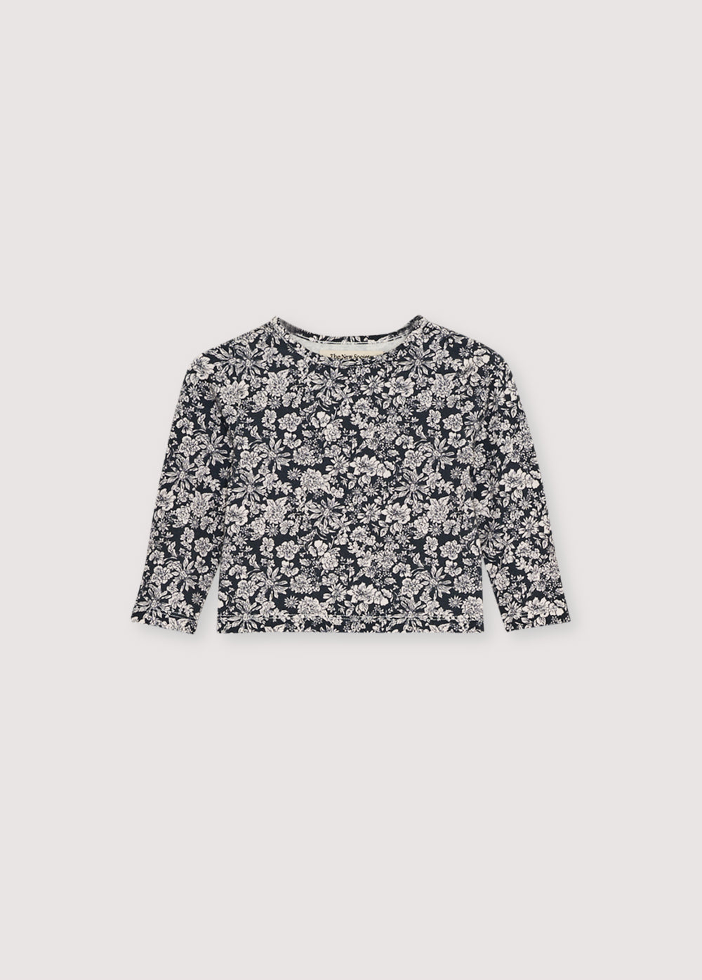 Jersey t-shirt with a round neck and floral print. Features a shoulder opening with tone-on-tone snaps. Pair with the matching leggings to complete the total look.