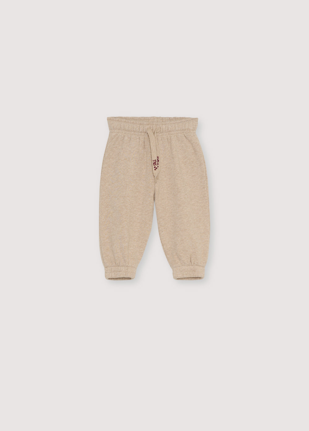 Fleece joggers with an elastic waistband and cuffs. Perfect for creating a comfortable total look with the matching sweatshirt. Brushed on the inside and outside. It features a beautiful embroidery on cord.