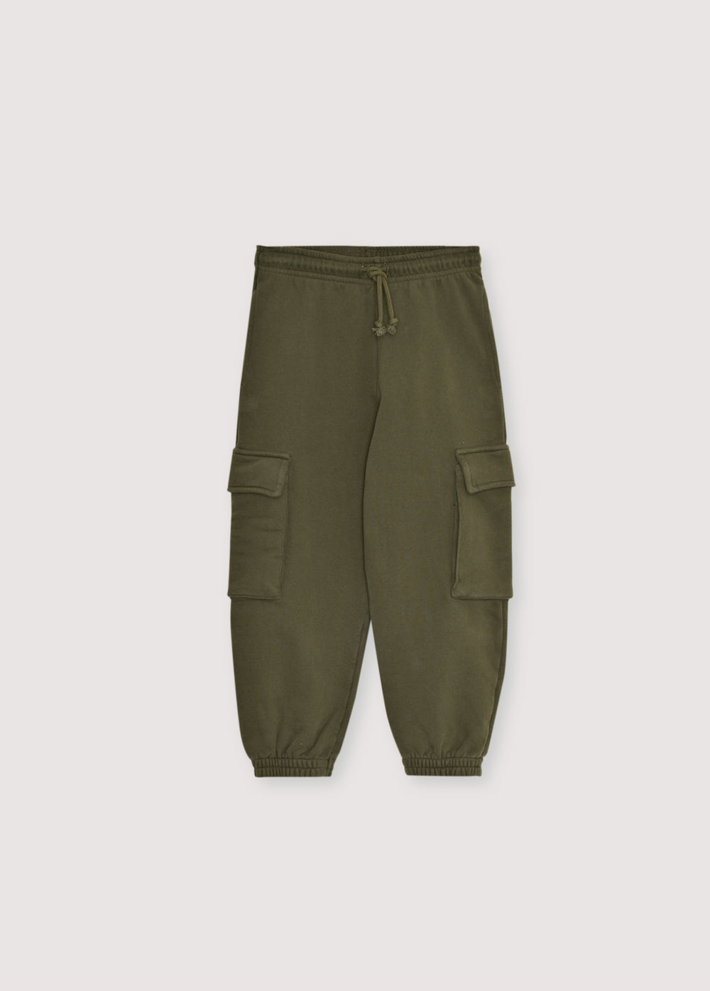 Cargo-style joggers with an elastic waistband and cuffs, featuring two cargo pockets. Brushed on the inside and outside.