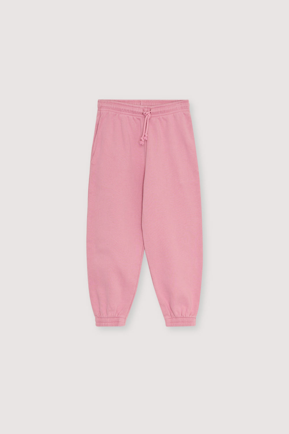 with an adjustable elastic waistband and drawstring, and elastic cuffs. Perfect for creating a comfortable total look with the matching sweatshirt. It features a brand print detail on the front side. Brushed on the inside and outside.