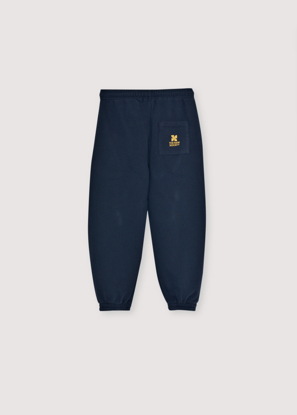 Fleece joggers brushed inside and outside with an adjustable elastic waistband and drawstring, and elastic cuffs. Brushed on the inside and outside. Perfect for creating a comfortable total look with the matching sweatshirt. It features a brand print detail on the front side.