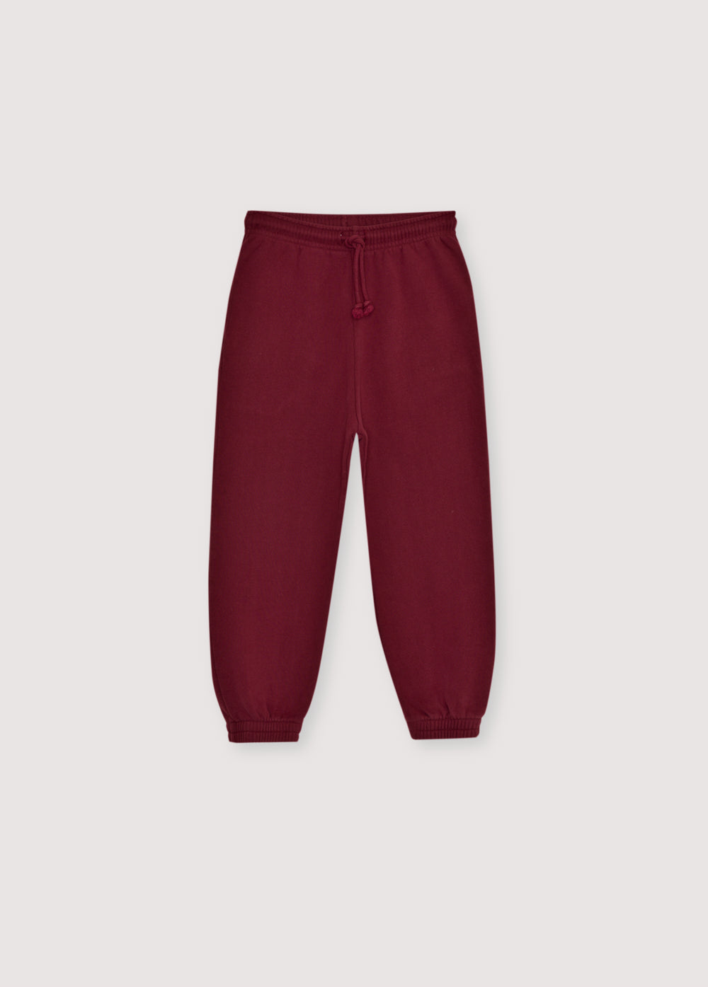 Fleece joggers brushed inside and outside with an adjustable elastic waistband and drawstring, and elastic cuffs. Perfect for creating a comfortable total look with the matching sweatshirt. It features a brand print detail on the front side. Brushed on the inside and outside.