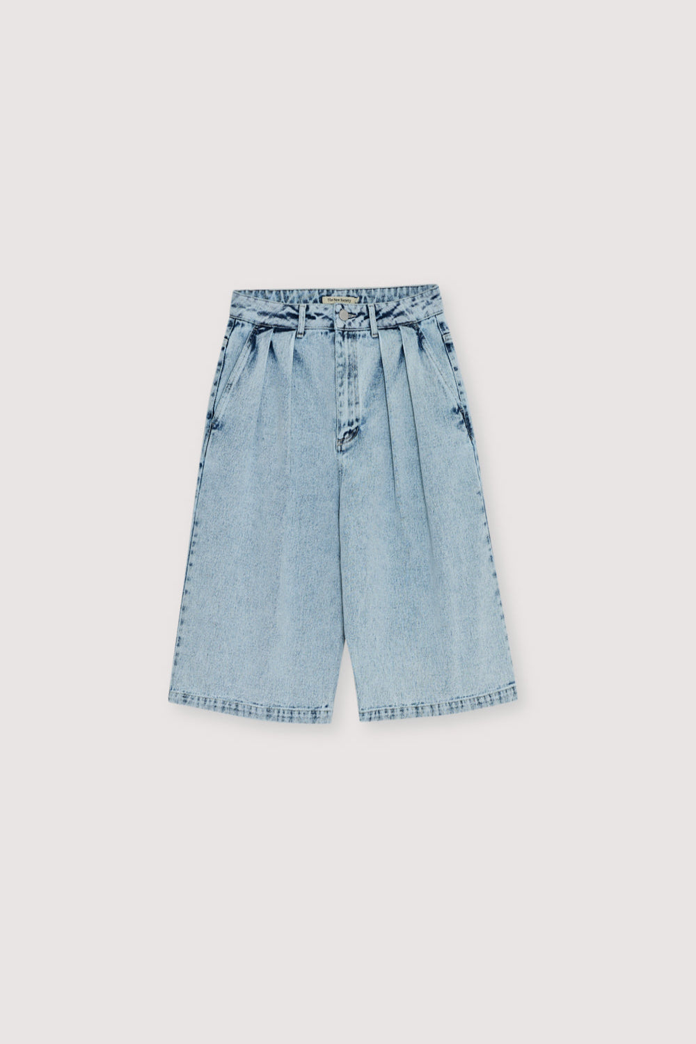 Bleach-wash denim bermuda designed with double front pleats for a structured yet relaxed silhouette.