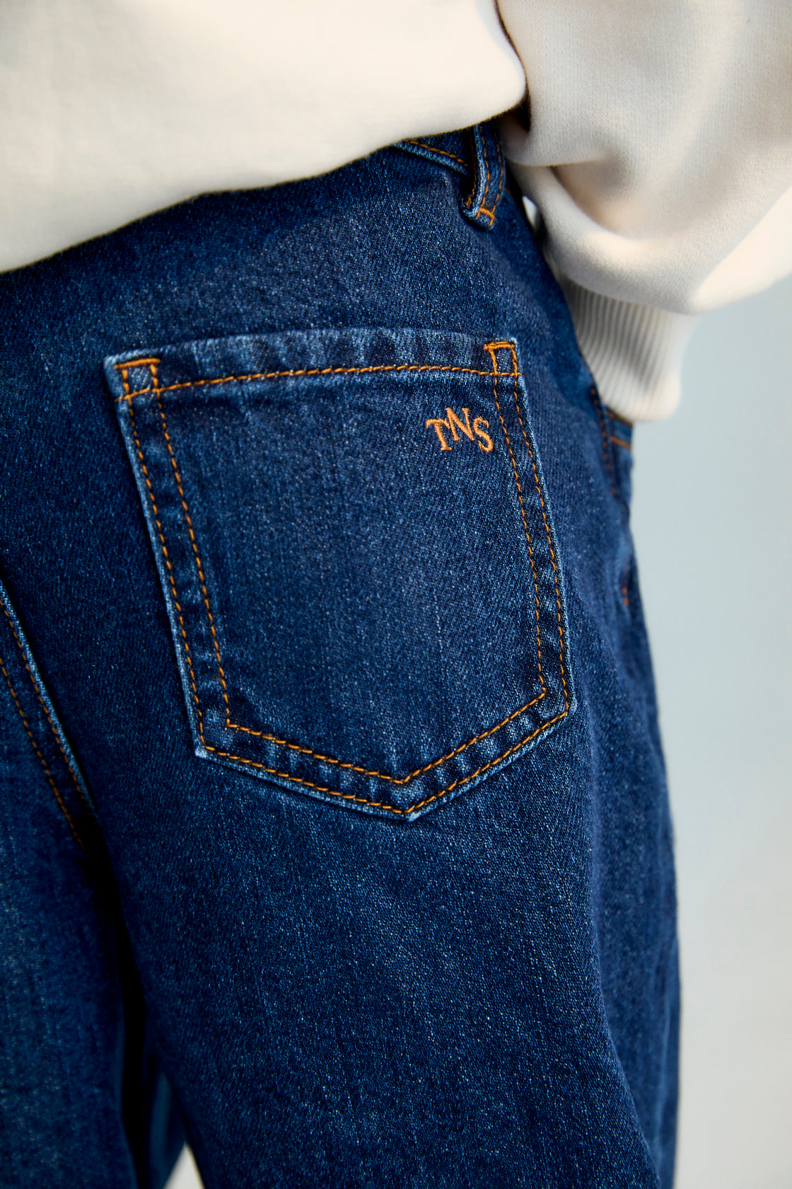 Classic and comfortable, this regular-fit blue denim is designed for everyday wear. It includes an adjustable elastic waistband on the inside for a better fit and long-lasting comfort.