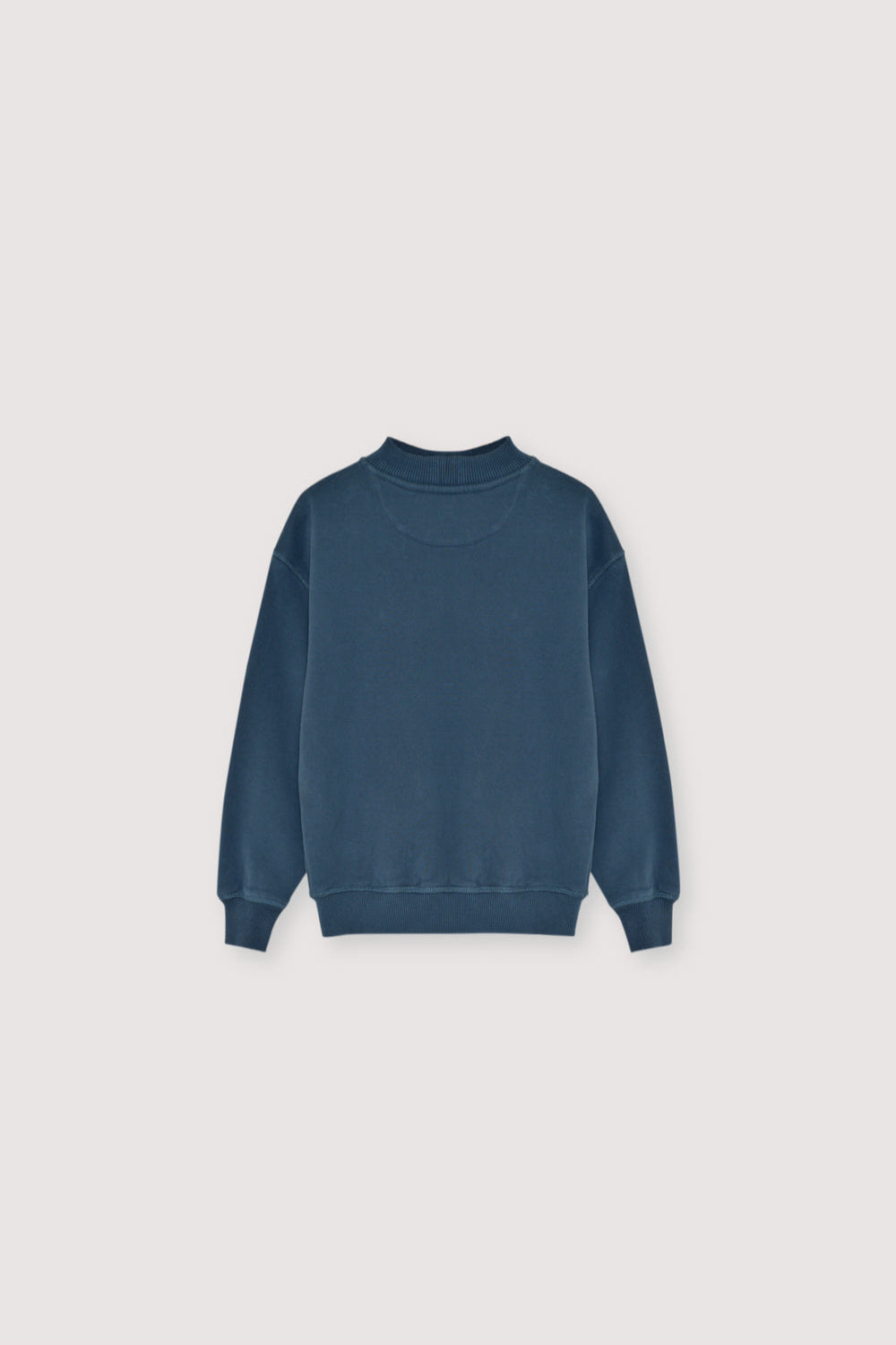 Blue sweatshirt on a light gray background