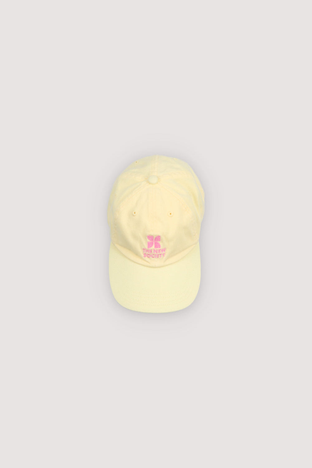 Brighten up your child’s outfit with this lemon-colored cap from ‘The New Society’ collection.