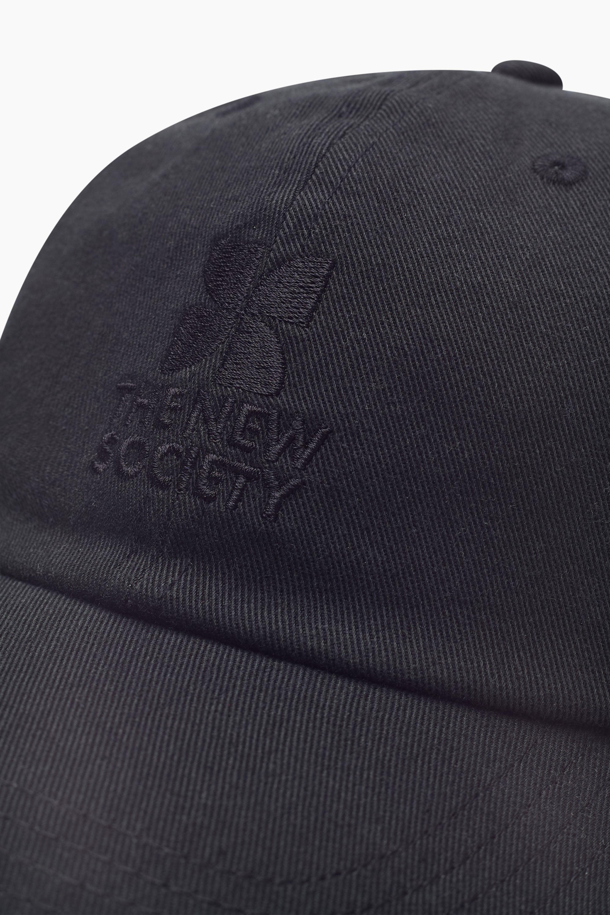 Logotipo de TNS Teen gorra