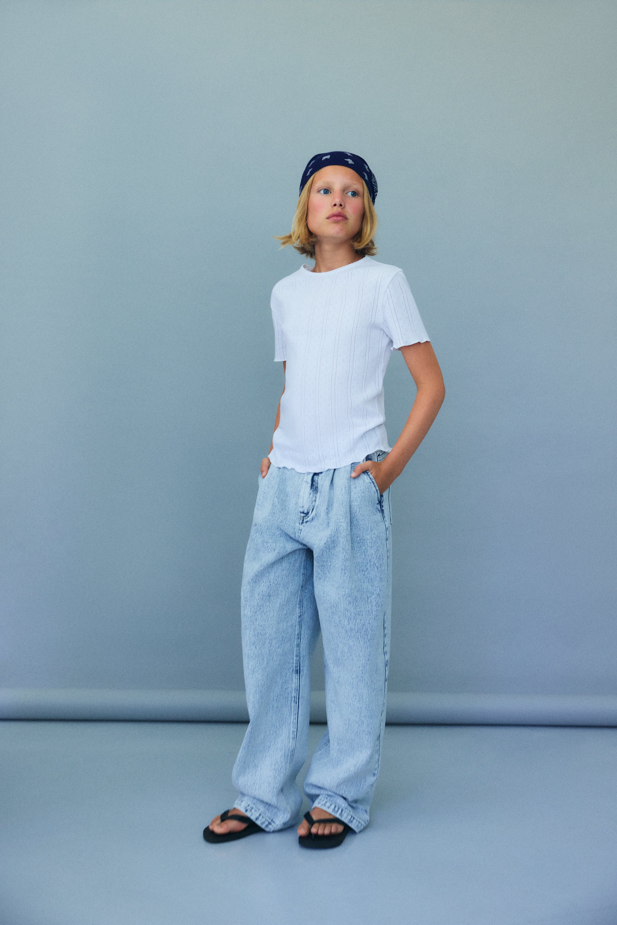Teen denim trousers crafted from bleach-washed cotton using our signature pinched denim pattern.