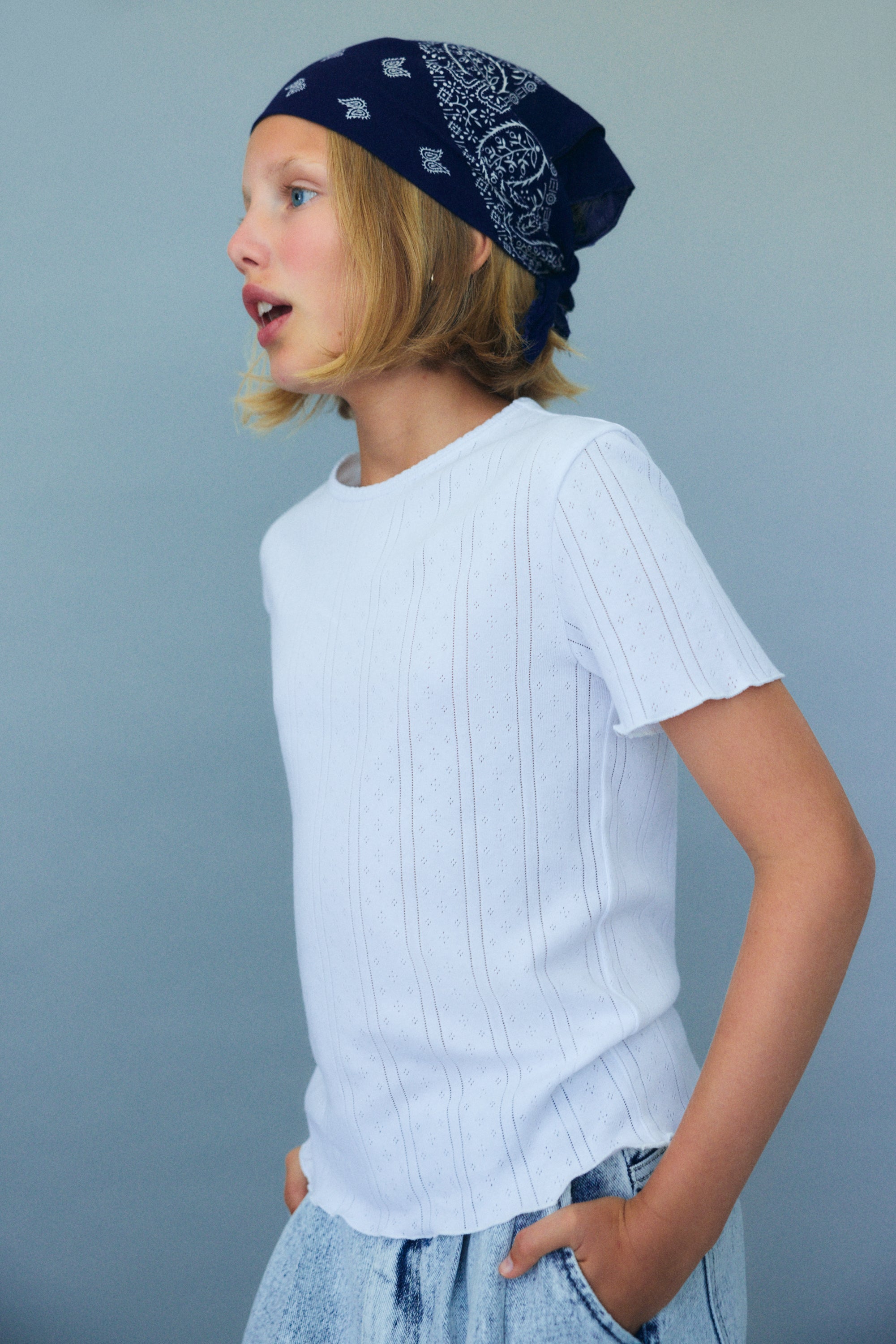 Teen denim trousers crafted from bleach-washed cotton using our signature pinched denim pattern.