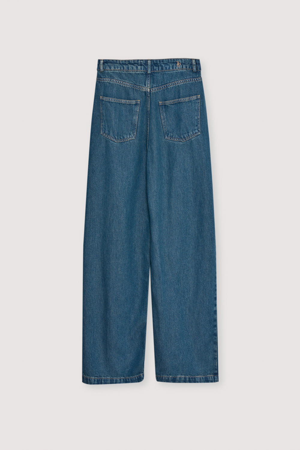 A customer favorite, these straight-leg Tencel trousers in blue denim offer a soft drape and a clean, tailored look