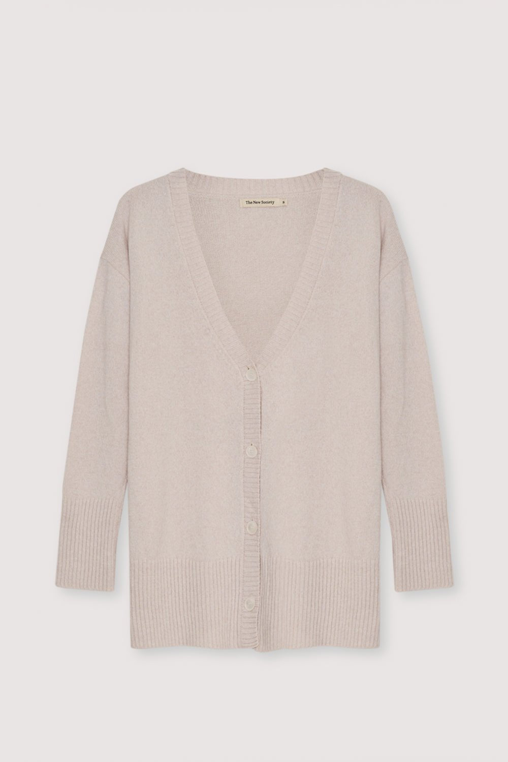 Cardigan oversize en maille cachemire avec boutons ton sur ton.