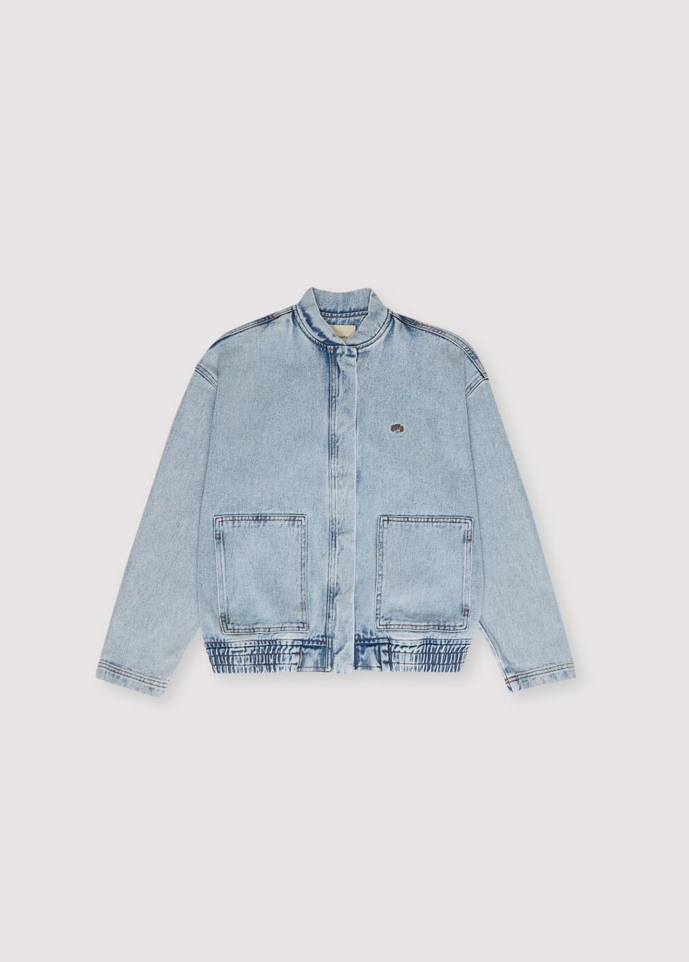 Chios Teen Bomber, our bestseller. Jacket in denim fabric 100% cotton, with front pockets and a central zipper. Spring Summer Collection. The New Society.