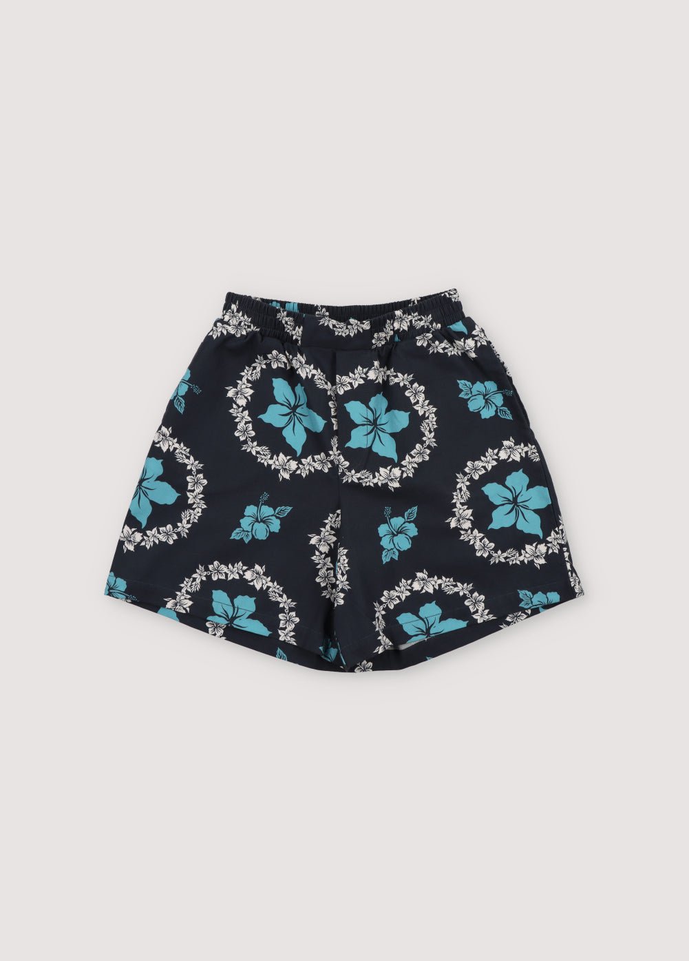 Dionisio Bermuda in 100% cotton fabric with our Kulkos Navy print, featuring an elastic waistband, zipper, and side pockets.