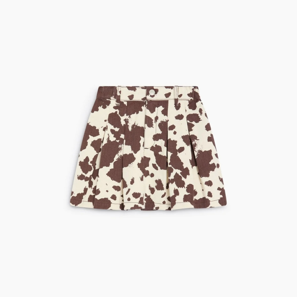 A high-waisted, pleated mini skirt with a brown and cream cow print pattern, shown flat against a light gray background.