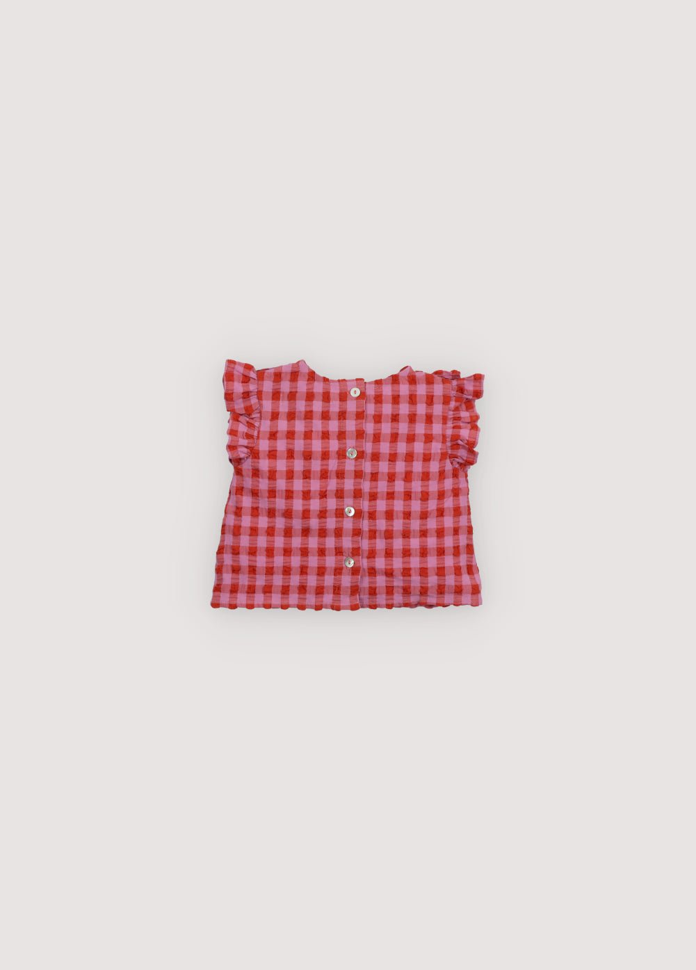 Iris Baby Blouse notre best-seller, maintenant disponible dans nos couleurs hibiscus et chili. Collection Printemps Été. The New Society.