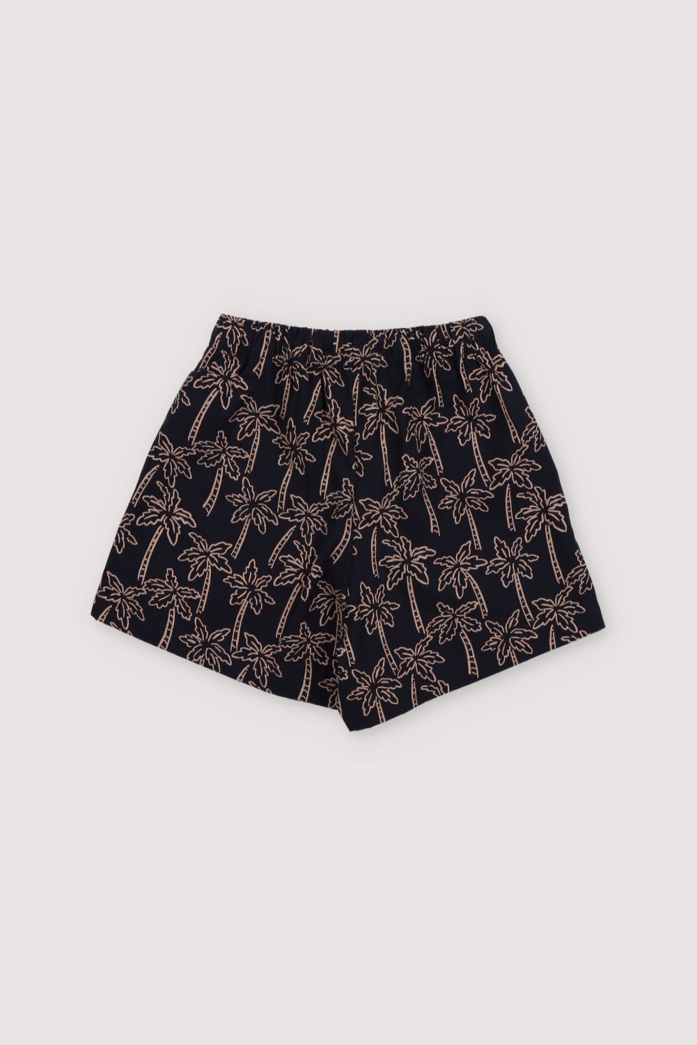 Ithaki Bermuda in 100% cotton with our Palms Navy print, elastic waistband, and adjustable drawstring.